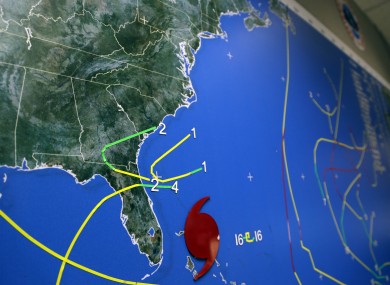 A map indicates Hurricane Sandy's position moving through the Bahamas off the east coast of Florida on Friday.