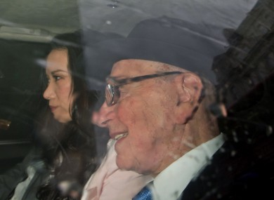 News Corp. chairman Rupert Murdoch and his wife Wendi Deng arrive at the High Court in London to give evidence to the Leveson Inquiry into phone hacking, Thursday, April 26, 2012.
