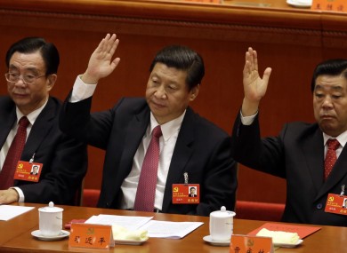 Chinese vice President Xi Jinping, center, at the closing ceremony for the 18th Communist Party Congress.