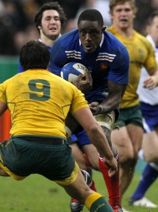 Yannick Nyanga of France charges at Australia's Nick Phipps last weekend.