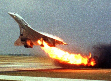 Air France Concorde flight 4590 takes off with fire trailing from its engine on the left wing from Charles de Gaulle airport in Paris