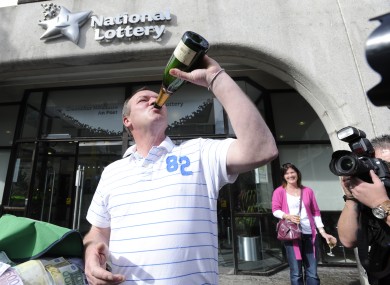 When you win the lotto, you can afford champagne. Glasses remain an unnecessary luxury, however.