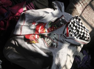 A Disney brand hoody lays among the equipment charred in the fire that killed 112 people.