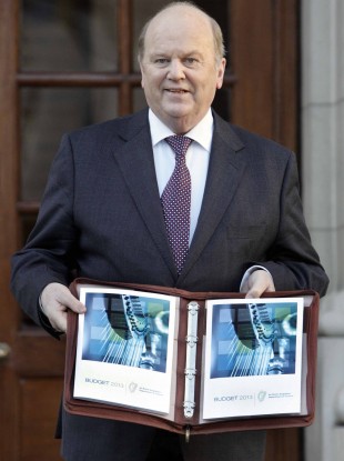 Finance Minister Michael Noonan with the Budget documents