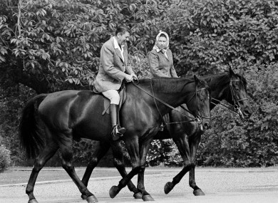 This photo, dated 8 June, 1982, shows US President Ronald Reagan, on Centennial, and Britain's Queen Elizabeth II, on Burmese, horseback riding in the grounds of Windsor Castle, England.