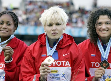 Russia's Olga Kuzenkova (middle) is currently under investigation after a seven-year-old sample tested positive for a banned substance.