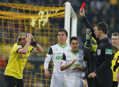 Marcel Schmelzer can't believe his German eyes as he is sent off.