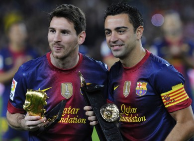 Messi (left) and Xavi are both products of the Barcelona youth system.