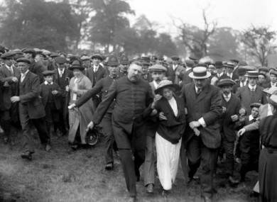 A suffragette being removed from a meeting addressed by Lloyd George in 1913.