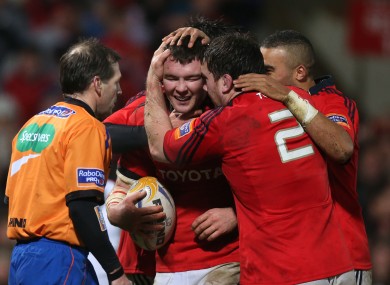 Damien Varley and Simon Zebo congratulate try-scoring Peter O'Mahony.