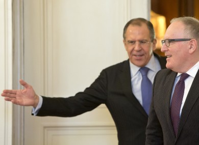 Russian Foreign Minister Sergey Lavrov, left, welcoming his Dutch counterpart Frans Timmermans for a meeting in Moscow, Russia, today.