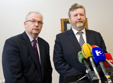HSE director general designate Tony O'Brien - who previously served as CEO of the National Treatment Purchase Fund - and health minister James Reilly.