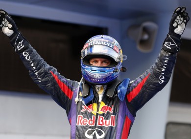 Red Bull driver Sebastian Vettel of Germany celebrates after winning the Malaysian Formula One Grand Prix.