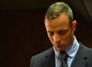 Oscar Pistorius enters court.