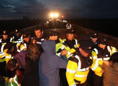 Shell to Sea activists clash with Gardai after they blocked the path of a convoy containing Tunnel Boring Machinery on its way to the Shell Bellanaboy Gas refinery in Co Mayo.