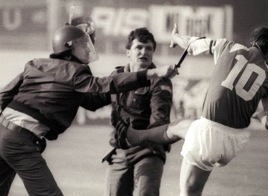 Dinamo Zagreb's Zvonimir Boban, right, clashes with police in 1991.