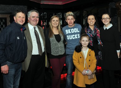 Niall Horan (in the 'Skool Sucks' top), Willie Penrose (beige suit), and pals