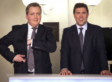 Sigmundur David Gunnlaugsson of the Progressive Party (left) and Bjarni Benediktsson of the Independence Party pose for pictures after the result