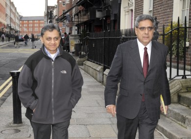 Ashoka Mody (left), seen here with IMF colleague Ajai Chopra, says an austerity-only policy in restoring Ireland's finances was a mistake.