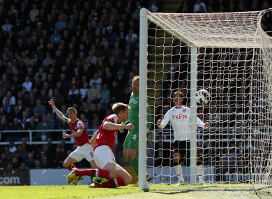 Mertesacker scores.