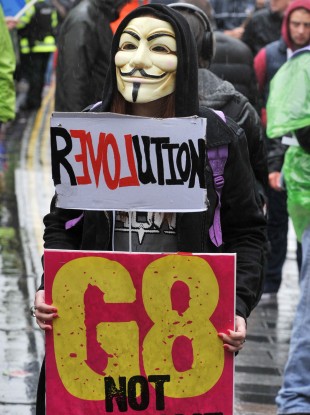 File: A G8 Not Welcome protestor on 15 June