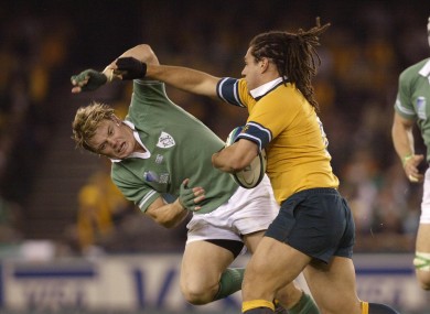 George Smith knocks Brian O'Driscoll aside in the 2003 World Cup.