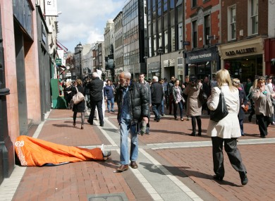 Homeless man on Grafton Street, Dublin.