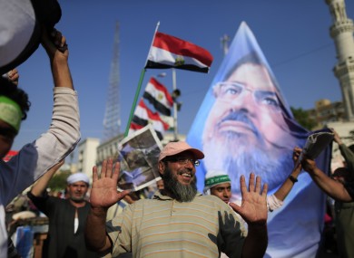 Supporters of ousted Egypt's Islamist President Mohammed Morsi chant slogans during a rally, in Nasser City, Cairo.