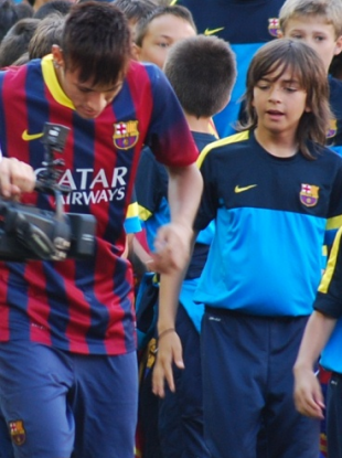 Neymar performs some tricks while Zak Gilsenan looks on.