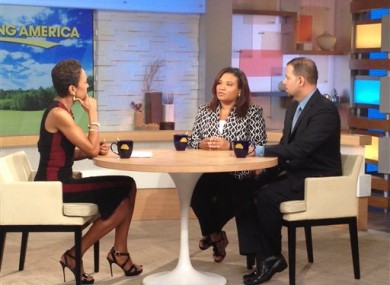 This image released by ABC shows host Robin Roberts, left, with Juror B29 from the George Zimmerman trial, center, and attorney David Chico on Good Morning America.