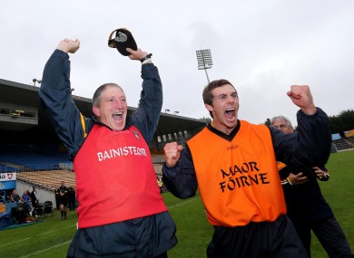 Antrim manager Kevin Ryan and senior Antrim captain Neil McManus celebrate at the final whistle last Saturday.