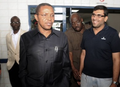 Tanzania President Jakaya Kikwete, left, accompanied with the Medical Director of Aga Khan Hospital-Dar es Salaam, Jaffer Dharsee, right, leave the hospital, after he had visited the two British women