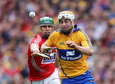 Cork's Brian Murphy and Conor McGrath of Clare.