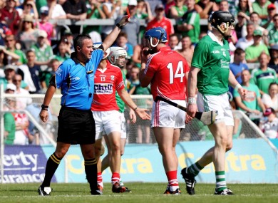 Referee James McGrath dismisses Patrick Horgan of Cork.