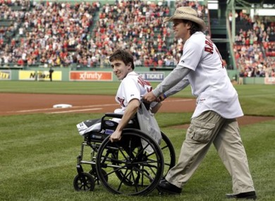 Jeff Bauman, Boston Marathon survivor with Carlos Arredondo at a sporting event some time after the attack.