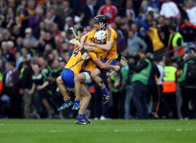 Patrick O'Connor, Cian Dillon and Patrick Donnellan of Clare celebrate at the final whistle.
