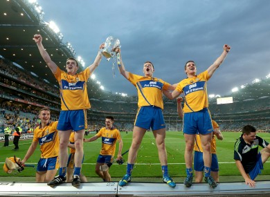 Tony Kelly, Aaron Cunningham and John Conlan celebrate.