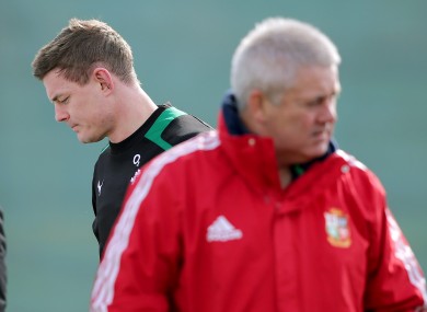 Brian O'Driscoll and Warren Gatland cross paths at an Ireland training session.