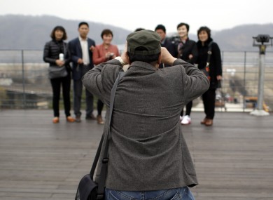 Chinese tourists take pictures at the Imjingak Pavilion in South Korea.