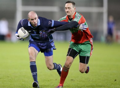 Ballymun Kickhams Kevin Leahy (right)
with Paul Cunningham of St Judes.