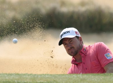 Graeme McDowell is four shots off the lead at the HSBC World Championships.