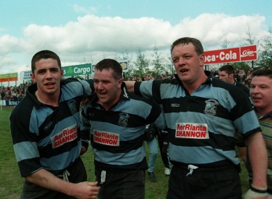 Alan Quinlan, Anthony Foley and Mick Galwey celebrate a playoff victory in 1998.