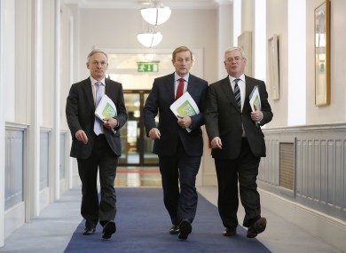 Richard Bruton, Enda Kenny and Eamon Gilmore at Government Buildings yesterday