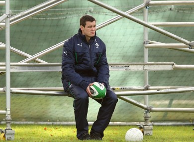 Jonny Sexton observes Ireland's training, on Tuesday, from a scaffold.