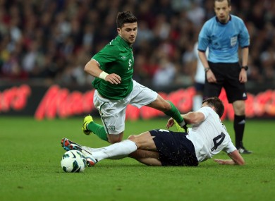 Shane Long in action for Ireland against England.