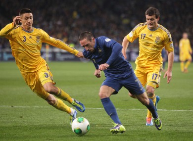 Franck Ribery with Evgeniy Haheridi, left, and Artem Fedetsky in the first leg.