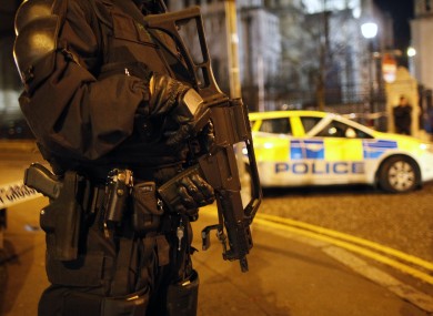 A PSNI officer close to the scene of the explosion in Belfast city centre last night