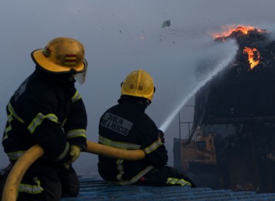 Firefighters fighting the blaze on Saturday morning.