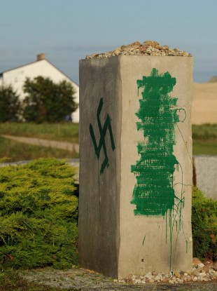 A Nazi swastika is seen in Jedwabne, Poland, on a monument dedicated to Jews.