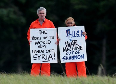Shannon Peace activists Niall Farrell and Margaretta D'arcy as they attempt to block the runway of Shannon Airport in protest at the use of the airport by US Military and also against western intervention in Syria.